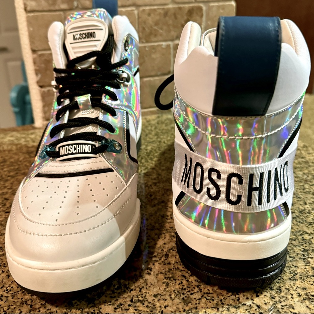 Moschino
Panelled High-Top Sneakers
Made in Italy